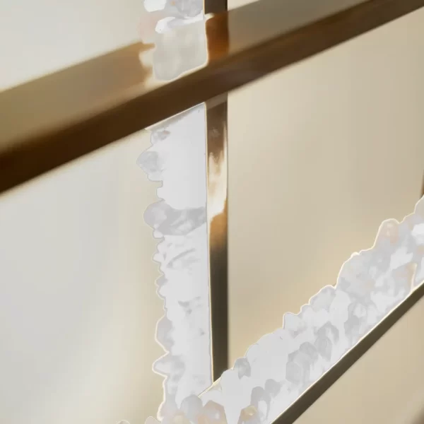 Wide perspective of dark silver leaf quartz pendant trios in the art gallery.