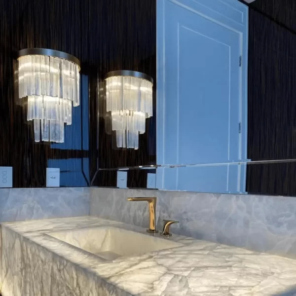 Wall light made of natural stone in a sophisticated bathroom.