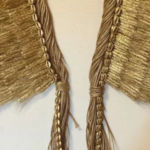 Close-up of the Indigenous Natural Fiber Headdress Antunes shell design on the Headdress, Indigenous Natural Fiber, Antunes, in a neutral environment.