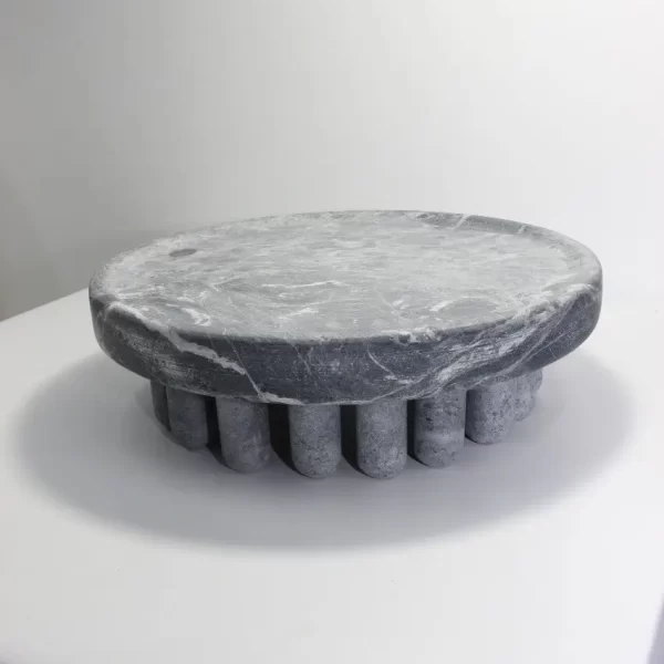 Large soapstone centerpiece on a white background from the Embrace collection.