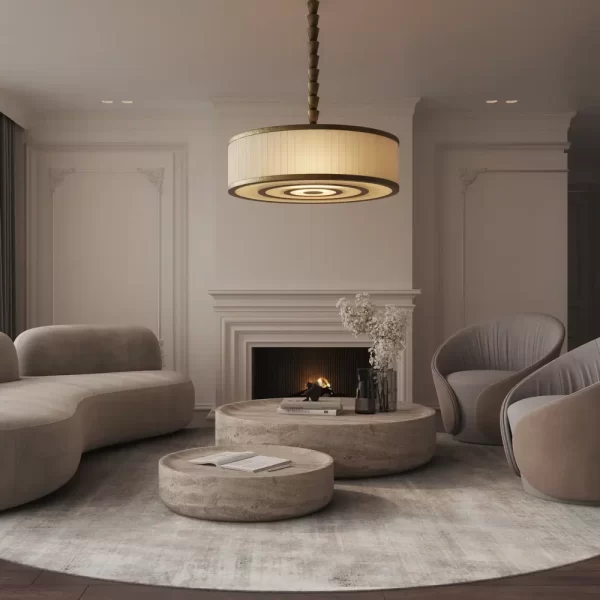 Chandelier casting a warm glow in a living room with a fireplace.