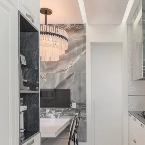 Selenite Paris Deluxe Chandelier in a modern kitchen-dining area.