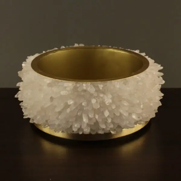 Minimalist quartz centerpiece on neutral background.
