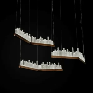 Artistic Display of Three Selenite LED Pendant Lights Lisbon in Dark Silver Leaf Finish, Set Against a Black Background