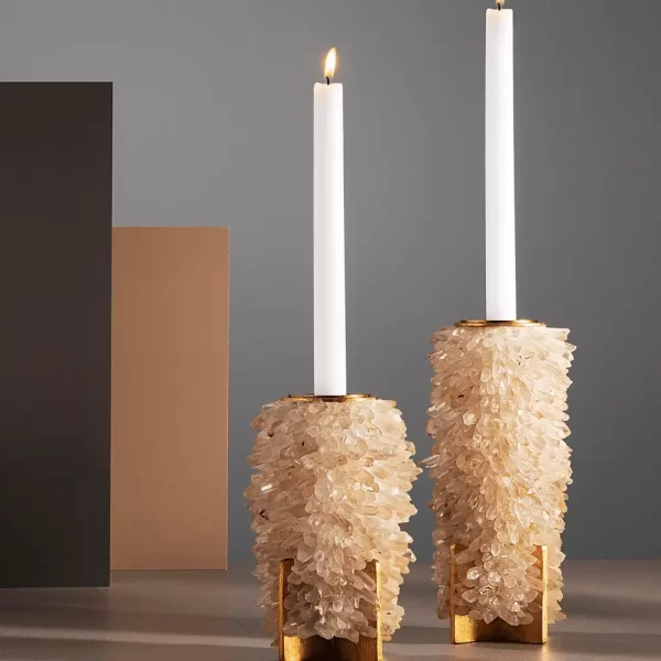 Par of Metal Gold leaf Candle Holder adorned with white crystals quartz and white background.