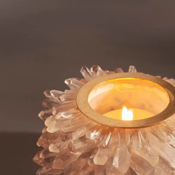 Close-up of Desiree IV Candle Holder revealing exquisite white quartz details and glowing candlelight, perfect for upscale interior design projects.