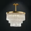 Selenite Chandelier Grand London with cascading selenite crystals, illuminated against a black background.