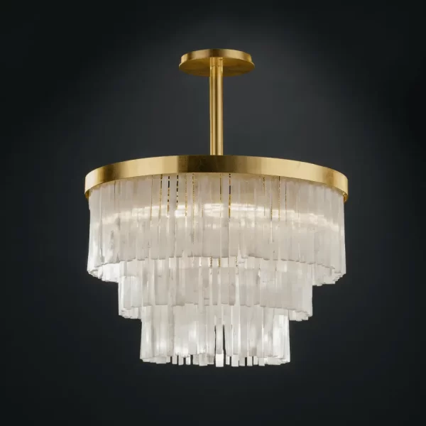 Selenite Chandelier Grand London with cascading selenite crystals, illuminated against a black background.