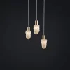 Distant View of 3 Milky Quartz Pendant Lamps Dublin Slim with Warm Silver Leaf Finish and Steel Cables.