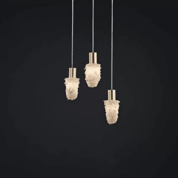 Distant View of 3 Milky Quartz Pendant Lamps Dublin Slim with Warm Silver Leaf Finish and Steel Cables.