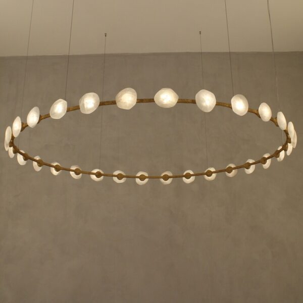 Oslo Artisan Crystal Quartz Round Halo Pendant full view displaying 72.8-inch circular design with 30 LED lights illuminating natural quartz stones in luxury dining room setting.