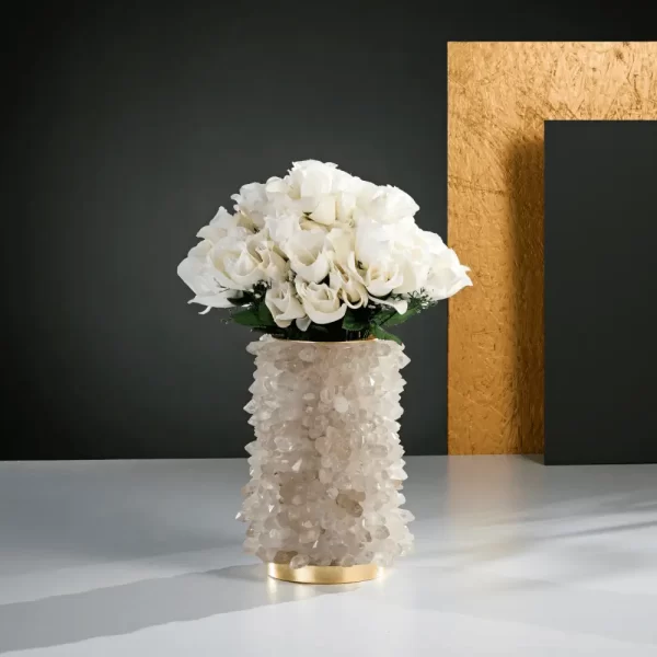 Front view of a Quartz Flower Pot adorned with white petals, highlighting its elegant design and warm gold leaf finish.