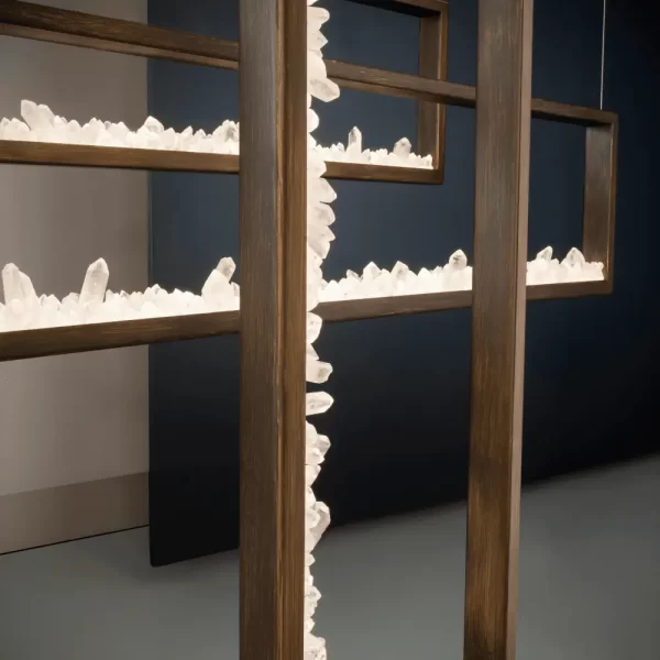 Detail of the support structure of quartz pendant trio in dark silver leaf.