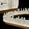 Close-Up of Selenite LED Chandelier San Francisco Pair in Dark Silver Leaf Finish, Studio Shot with Black Background.