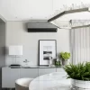 Selenite LED Chandelier San Francisco in Silver Leaf Finish with White Quartz, Positioned Above a Dining Table