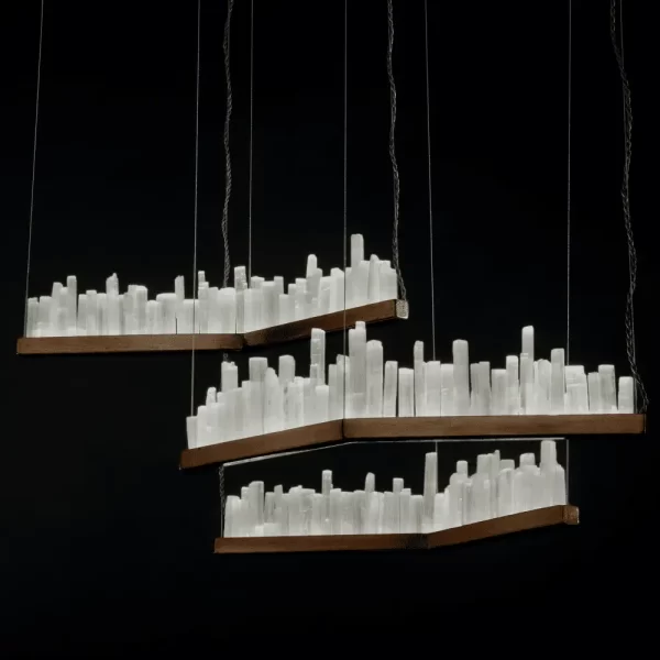 Trio of Selenite LED Pendant Lights Lisbon in Dark Silver Leaf Finish, Set Against a Black Background