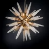 Vancouver quartz Sputnik chandelier, 31.5 inches, 12 E14 bulbs, Gold leaf finish, black background.