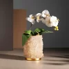 Front view of a Quartz Flower Pot adorned with white petals, highlighting its elegant design and warm gold leaf finish.