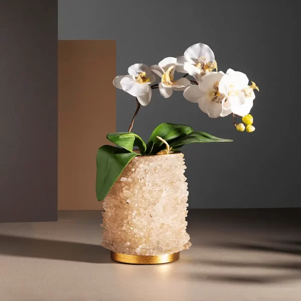 Front view of a Quartz Flower Pot adorned with white petals, highlighting its elegant design and warm gold leaf finish.