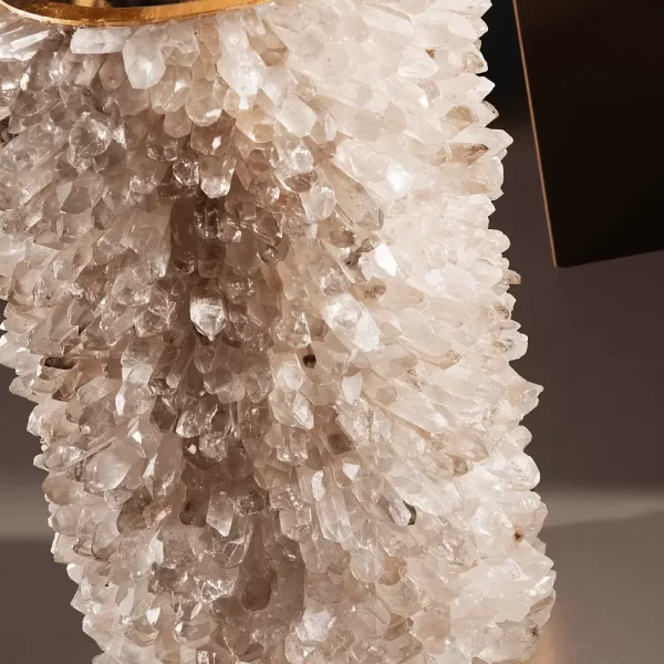 Zoomed-in detail of White Quartz Vase with warm gold leaf finish, focusing on the vase's craftsmanship and green leaves.