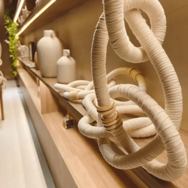 Wooden Cotton Chain Link Wall Décor on Low Shelf in Living Room